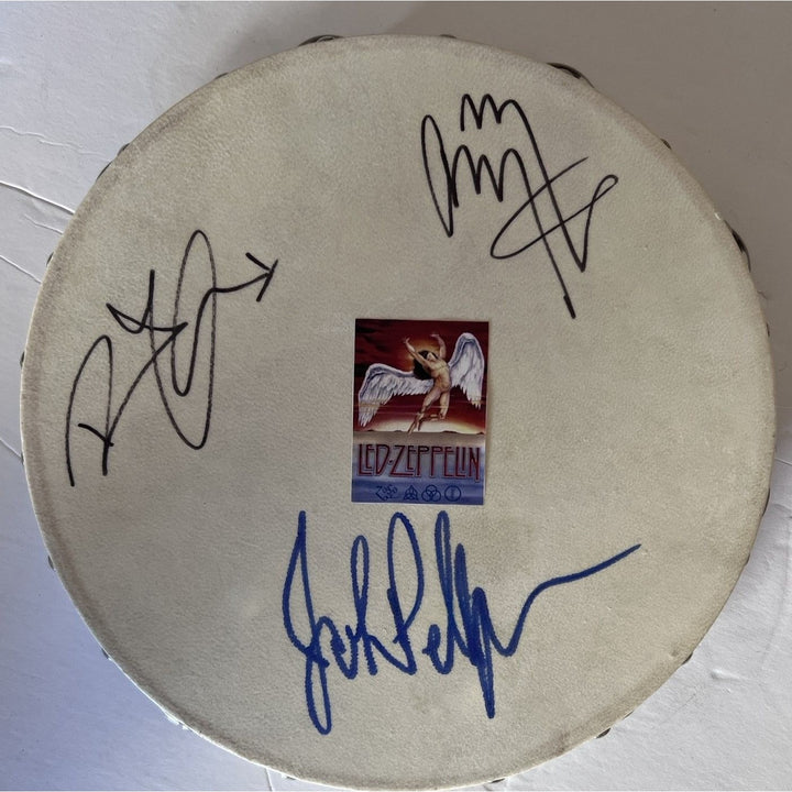 Led Zeppelin Jimmy Page, Robert Plant, John Paul Jones, 14-inch tambourine signed with proof