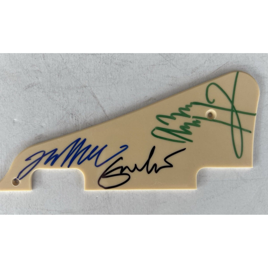 Jimmy Page Eric Clapton & Jeff Beck Gibson Les Paul pickguard signed with proof.