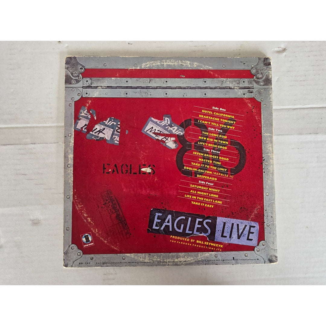 The Eagles ''Live'' LP signed with proof.