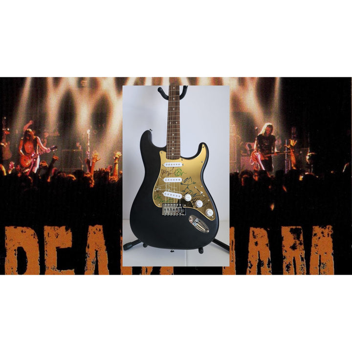 Eddie Vedder, Matt McCready, Matt Cameron, Stone Gossard, Jeff Amen, Pearl Jam Fender Stratocaster Squier electric guitar signed with proof