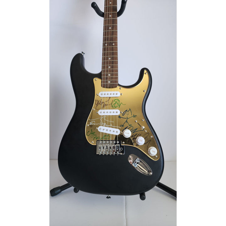 Eddie Vedder, Matt McCready, Matt Cameron, Stone Gossard, Jeff Amen, Pearl Jam Fender Stratocaster Squier electric guitar signed with proof