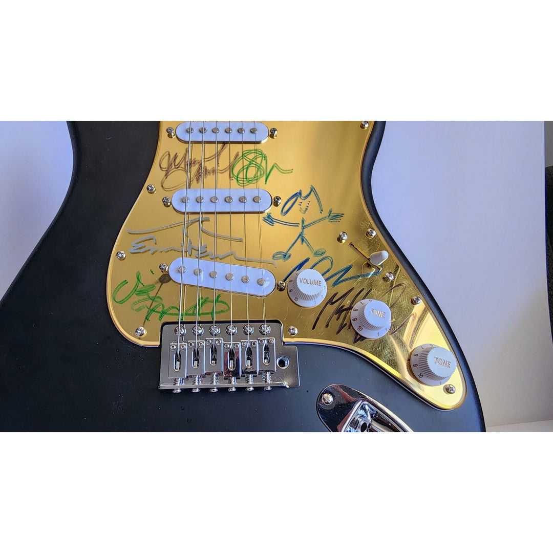 Eddie Vedder, Matt McCready, Matt Cameron, Stone Gossard, Jeff Amen, Pearl Jam Fender Stratocaster Squier electric guitar signed with proof