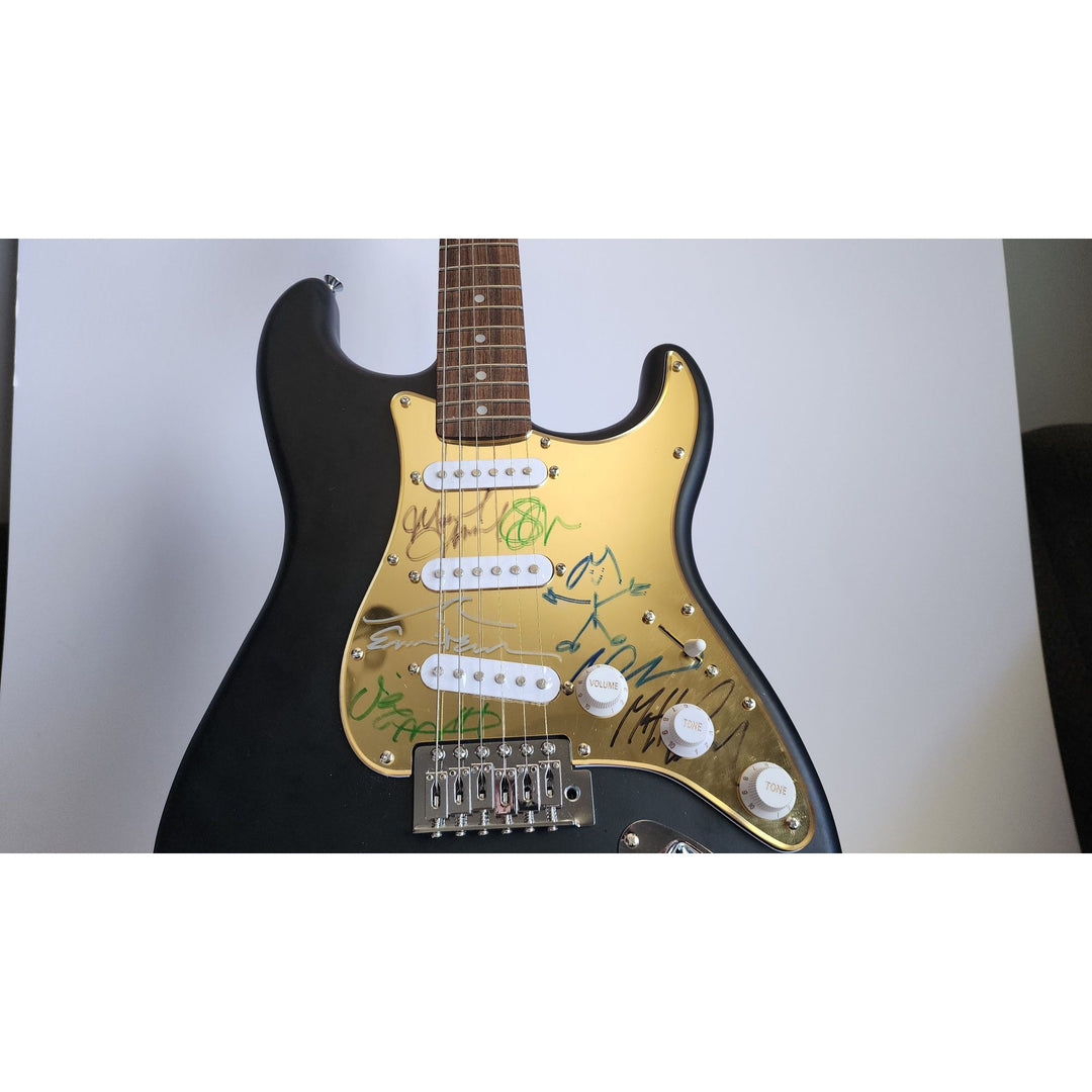 Eddie Vedder, Matt McCready, Matt Cameron, Stone Gossard, Jeff Amen, Pearl Jam Fender Stratocaster Squier electric guitar signed with proof