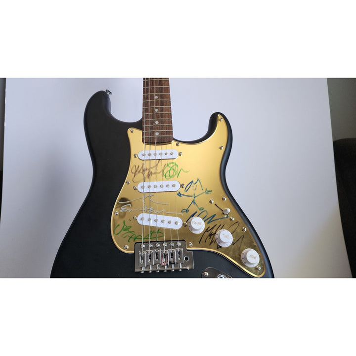 Eddie Vedder, Matt McCready, Matt Cameron, Stone Gossard, Jeff Amen, Pearl Jam Fender Stratocaster Squier electric guitar signed with proof