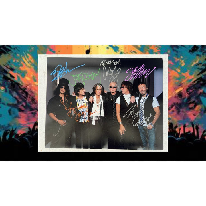 Slash Ronnie Wood Joe Perry Jimmy Page Jeff Beck and Paul Rodgers 11x14 photo signed with proof.