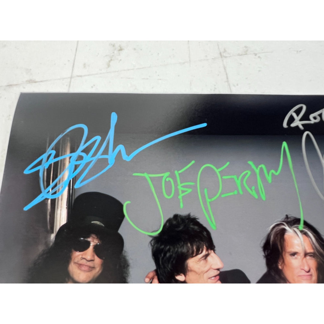 Slash Ronnie Wood Joe Perry Jimmy Page Jeff Beck and Paul Rodgers 11x14 photo signed with proof.