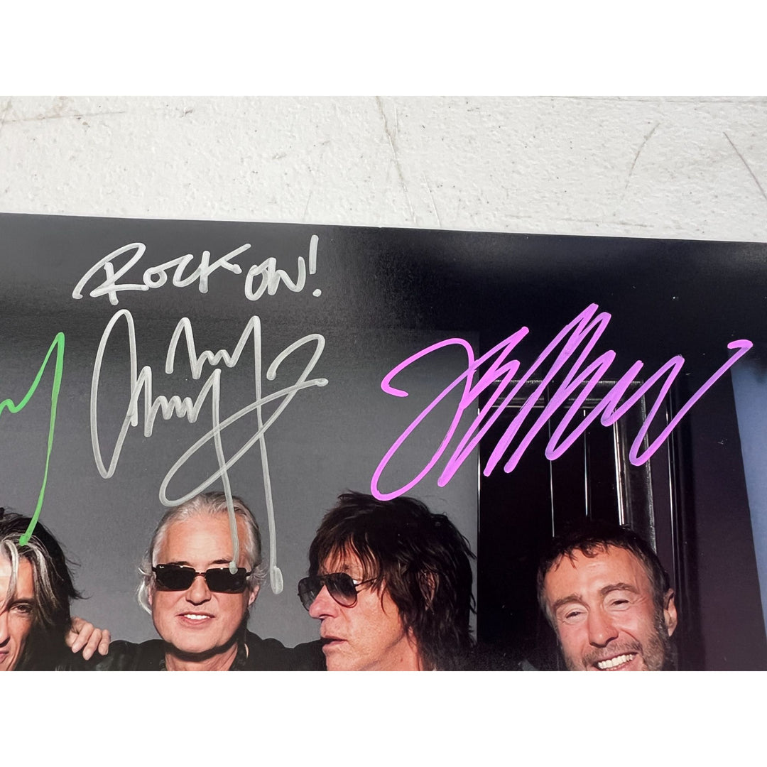 Slash Ronnie Wood Joe Perry Jimmy Page Jeff Beck and Paul Rodgers 11x14 photo signed with proof.