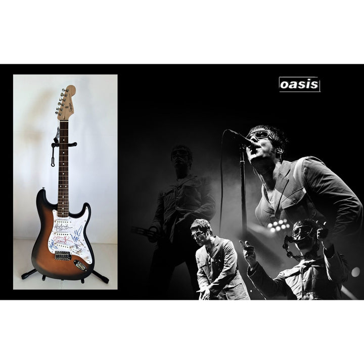 Oasis Liam & Noel Gallagher, Fender Stratocaster electric guitar signed with proof