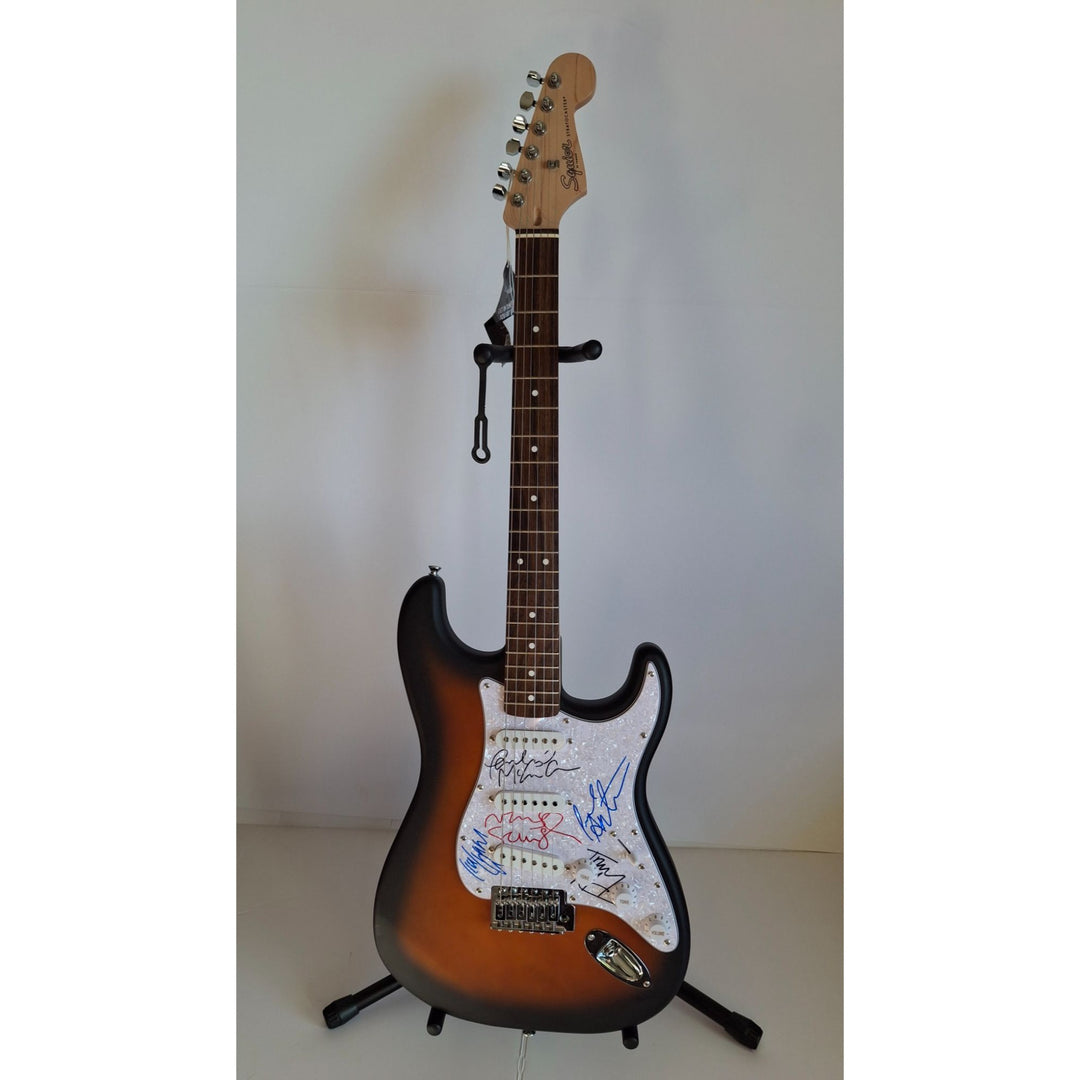 Oasis Liam & Noel Gallagher, Fender Stratocaster electric guitar signed with proof
