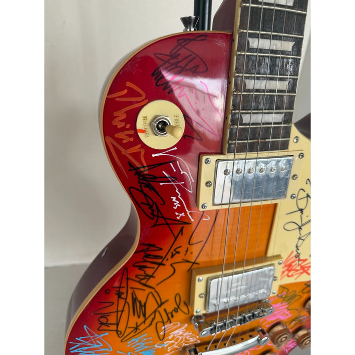Heavy Metals Greatest bands Black Sabbath Metallica Judas Priest Iron Maiden Cherry Les Paul electric guitar signed with proof.