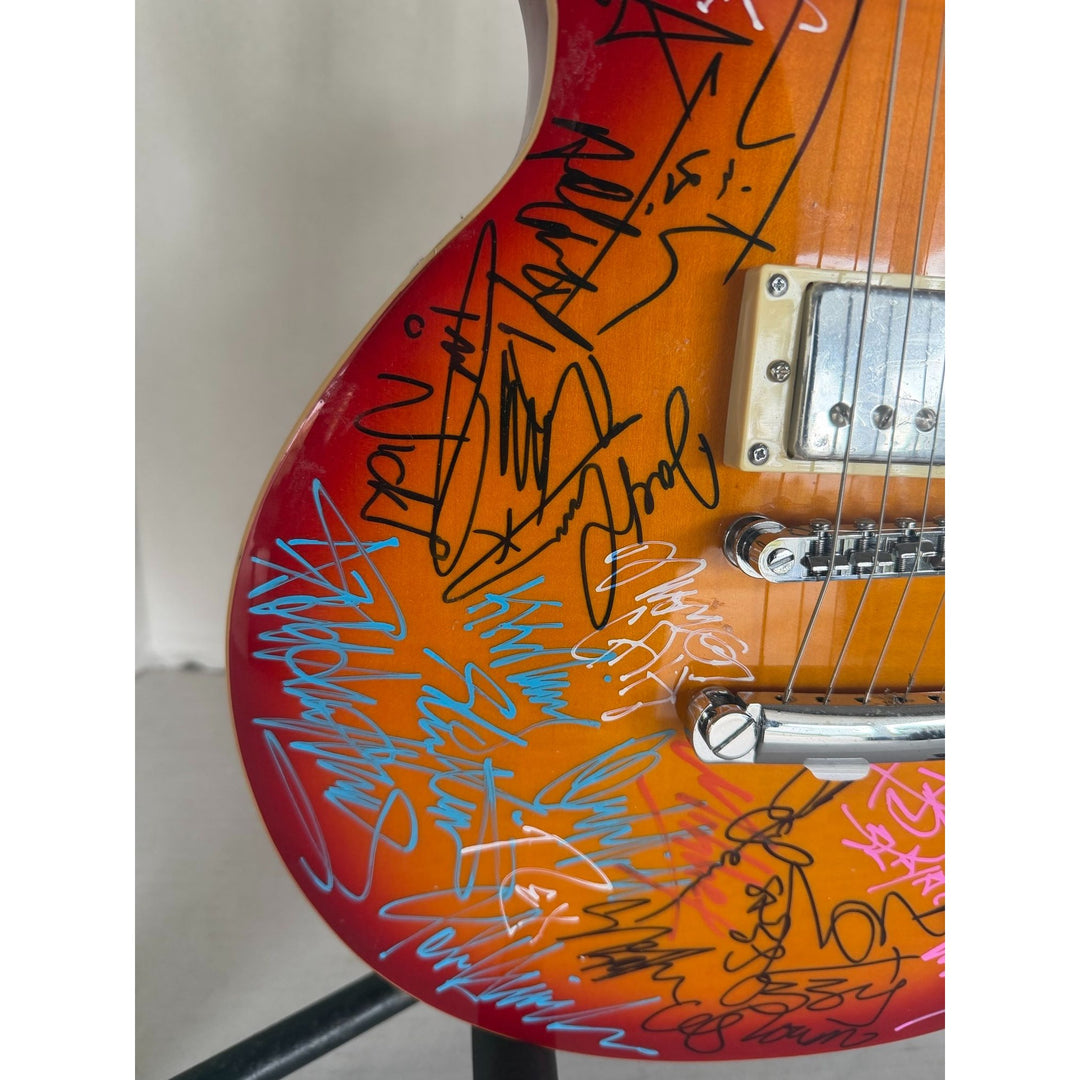 Heavy Metals Greatest bands Black Sabbath Metallica Judas Priest Iron Maiden Cherry Les Paul electric guitar signed with proof.