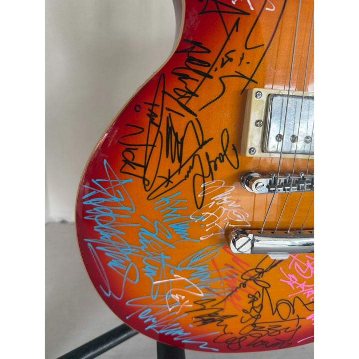 Heavy Metals Greatest bands Black Sabbath Metallica Judas Priest Iron Maiden Cherry Les Paul electric guitar signed with proof.