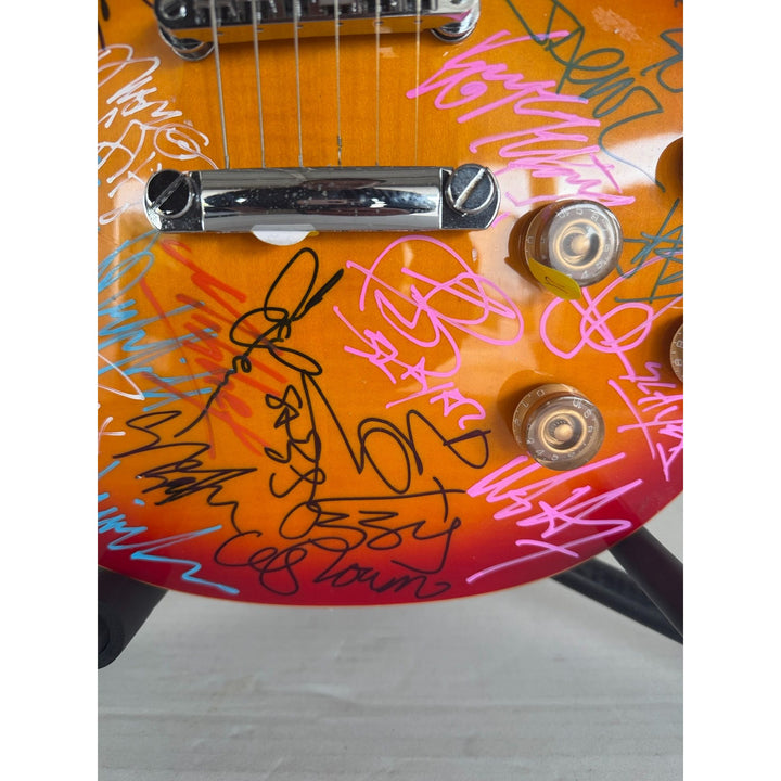 Heavy Metals Greatest bands Black Sabbath Metallica Judas Priest Iron Maiden Cherry Les Paul electric guitar signed with proof.