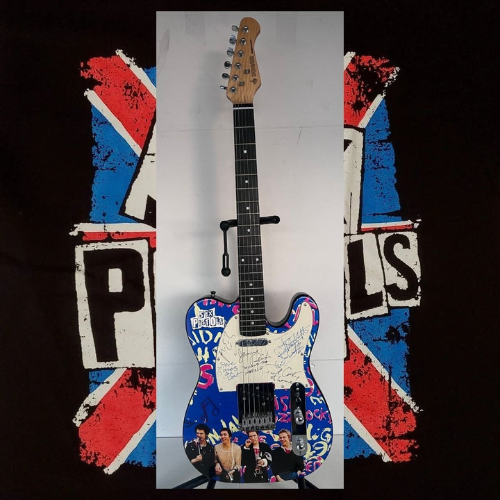 The Sex Pistols John Lyndon "Johnny Rotten", Glen Matlock, Paul Cook, Steve Jones one of a kind telecaster electric guitar signed with proof.
