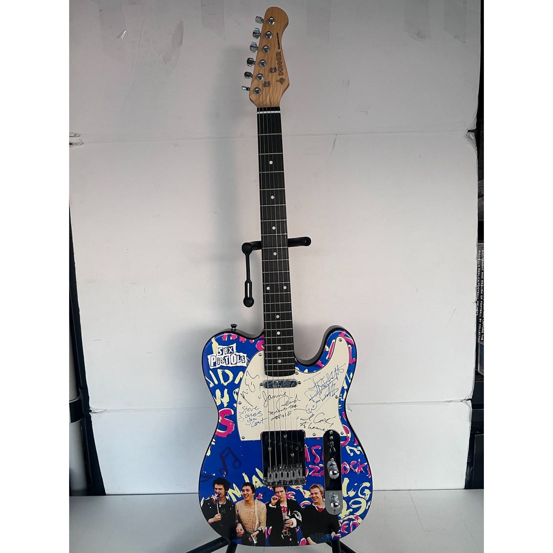 The Sex Pistols John Lyndon "Johnny Rotten", Glen Matlock, Paul Cook, Steve Jones one of a kind telecaster electric guitar signed with proof.