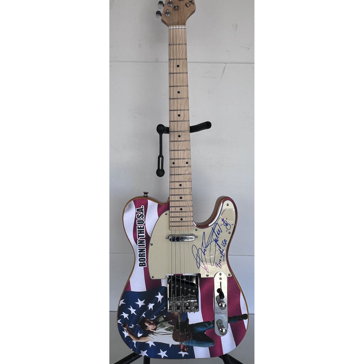 Bruce Springsteen signed with inscription and hand sketch one of a kind full size electric guitar signed with proof.