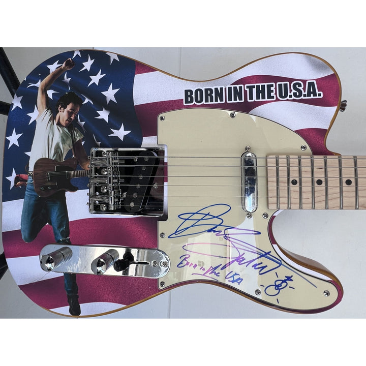 Bruce Springsteen signed with inscription and hand sketch one of a kind full size electric guitar signed with proof.