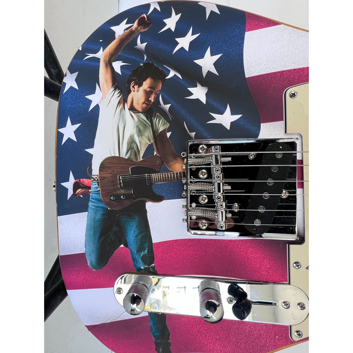 Bruce Springsteen signed with inscription and hand sketch one of a kind full size electric guitar signed with proof.