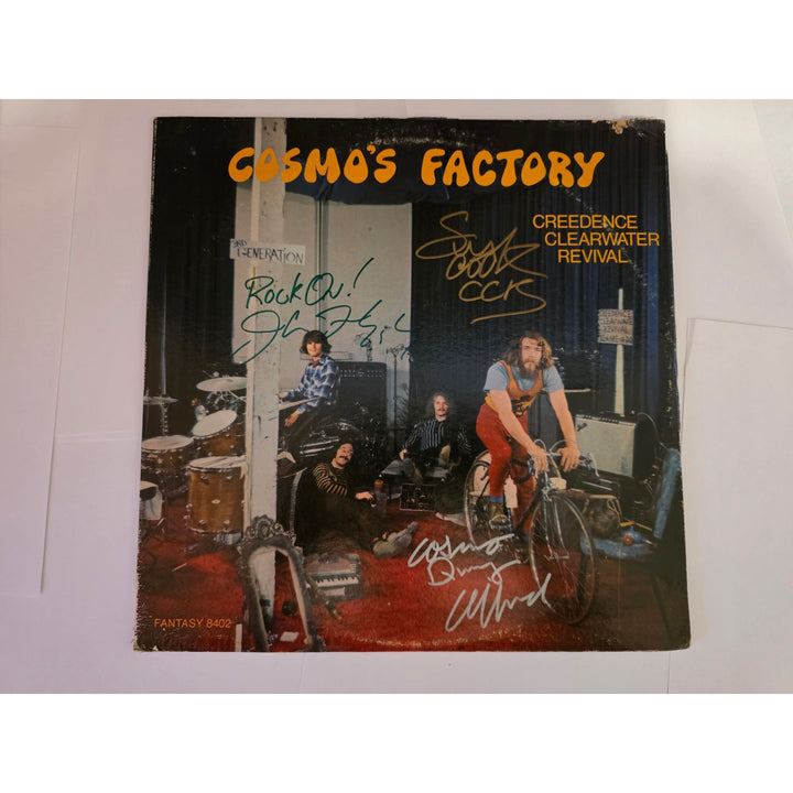Tom and John Fogarty Stu Cook dog Clifford Cosmos Factory original LP signed with proof.