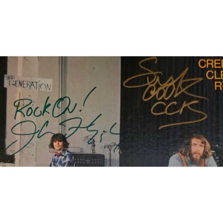 Tom and John Fogarty Stu Cook dog Clifford Cosmos Factory original LP signed with proof.