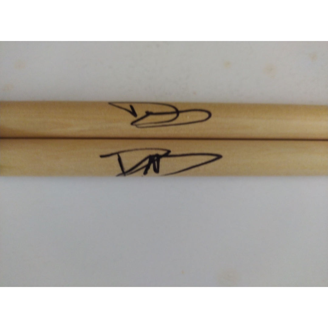 David Grohl Nirvana Foo Fighters drummer signed drumsticks with proof.
