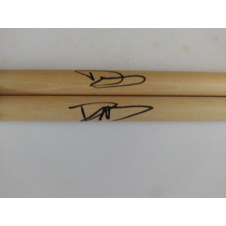 David Grohl Nirvana Foo Fighters drummer signed drumsticks with proof.