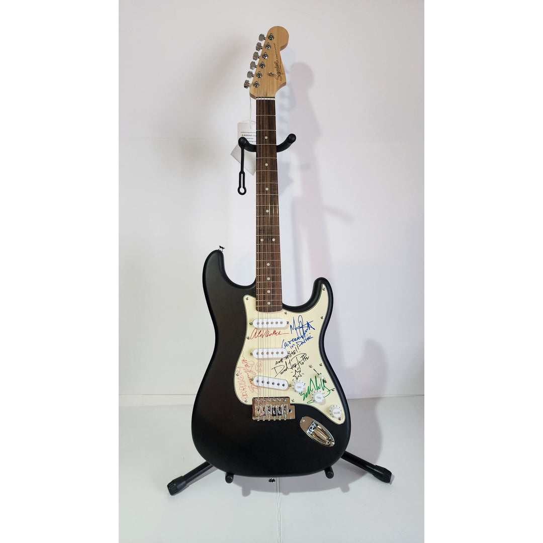 Van Halen Eddie & Ale, Michael Anthony, David Lee Roth, Sammy Hagar, Fender Stratocaster electric guitar signed with proof