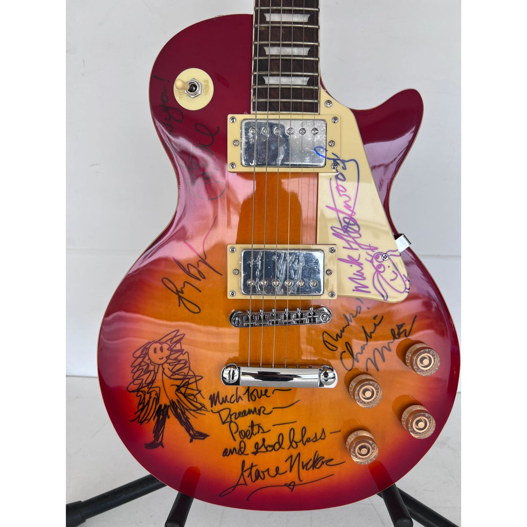 Fleetwood Mac vintage les paul signed by Mick Fleetwood, Christine McVie, John McVie, Stevie Nicks and Lindsey Buckingham signed with proof.