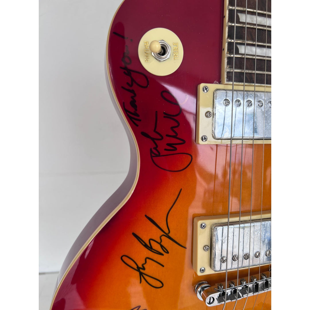 Fleetwood Mac vintage les paul signed by Mick Fleetwood, Christine McVie, John McVie, Stevie Nicks and Lindsey Buckingham signed with proof.