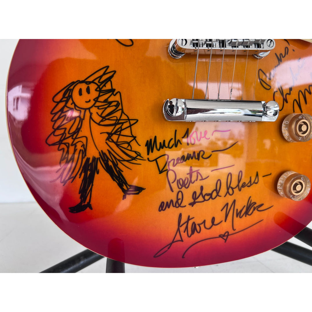 Fleetwood Mac vintage les paul signed by Mick Fleetwood, Christine McVie, John McVie, Stevie Nicks and Lindsey Buckingham signed with proof.