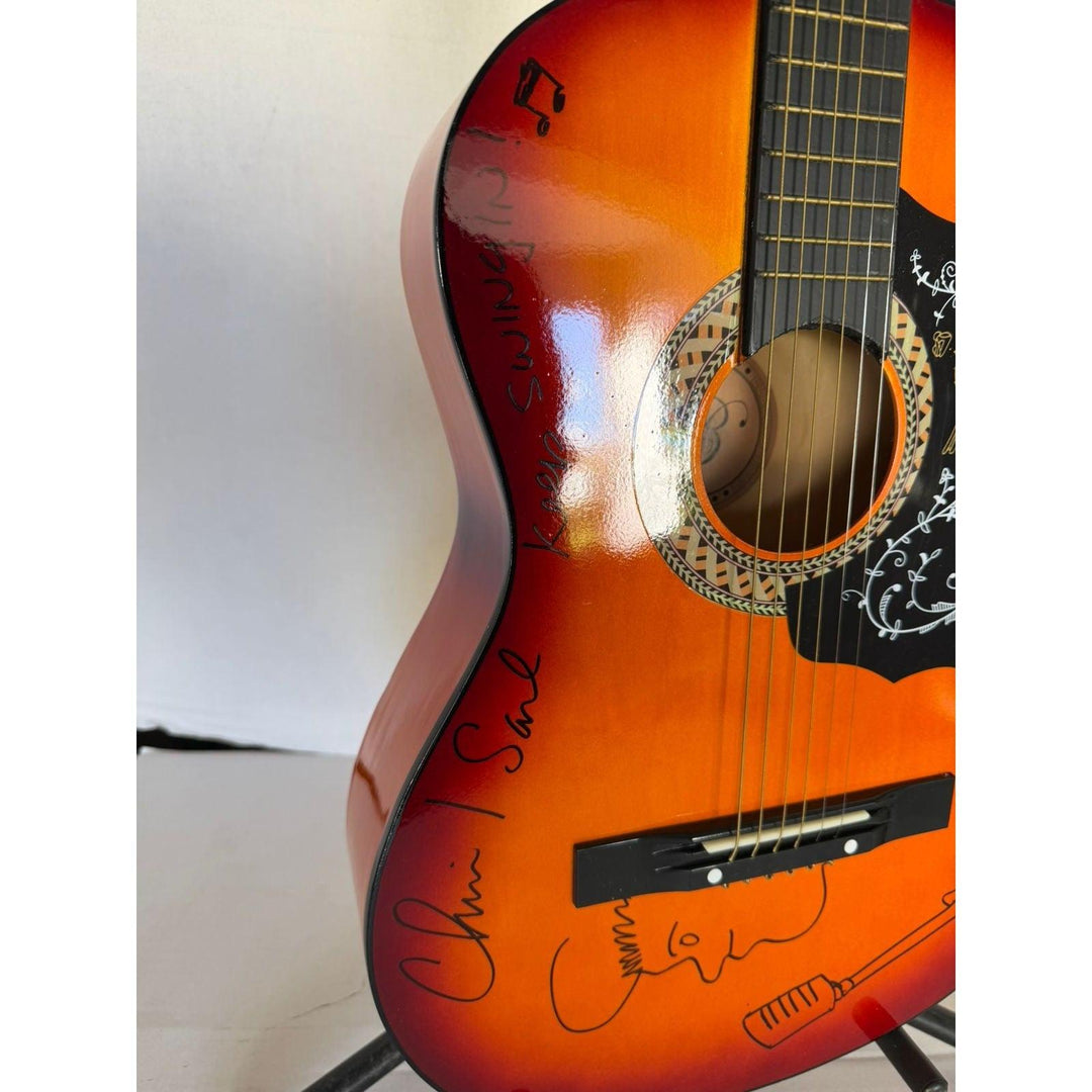 Chris Isaak vintage acoustic guitar signed and sketched with proof