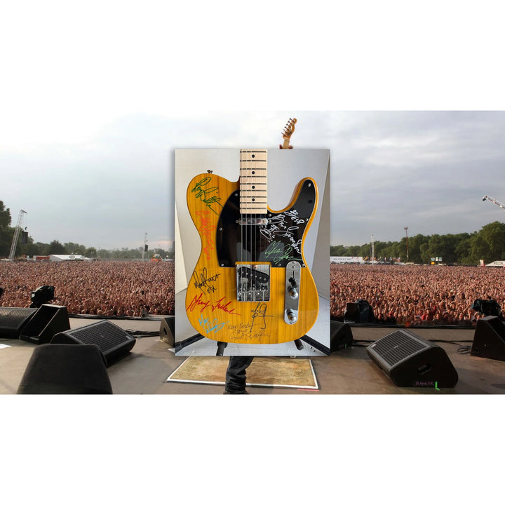 Bruce Springsteen and the E street band Telecaster electric guitar signed with proof.