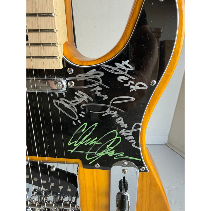 Bruce Springsteen and the E street band Telecaster electric guitar signed with proof.