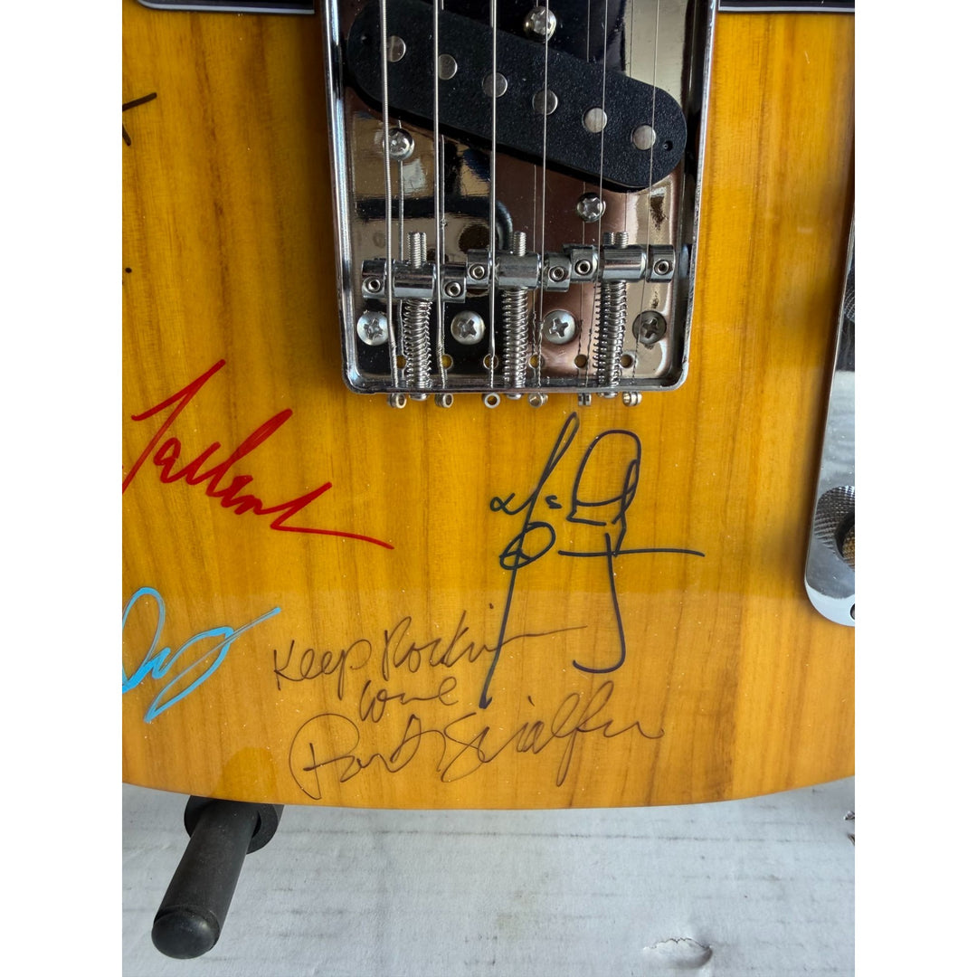 Bruce Springsteen and the E street band Telecaster electric guitar signed with proof.