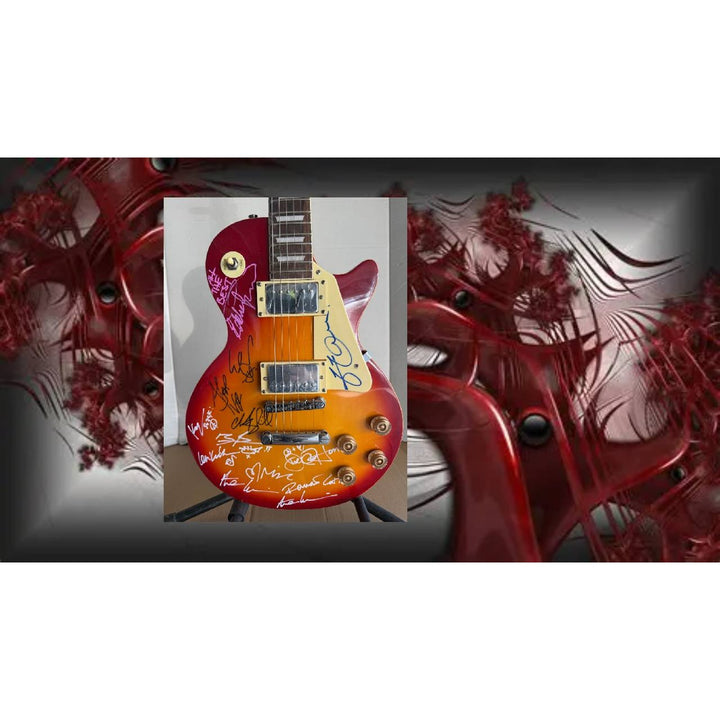 Tears For Fears, Simple Minds, and Simply Red les paul  vintage electric guitar signed with full provenance and photo proof..