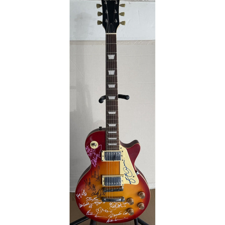 Tears For Fears, Simple Minds, and Simply Red les paul  vintage electric guitar signed with full provenance and photo proof..
