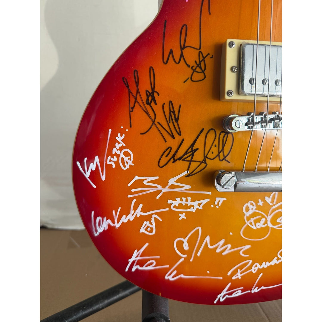 Tears For Fears, Simple Minds, and Simply Red les paul  vintage electric guitar signed with full provenance and photo proof..