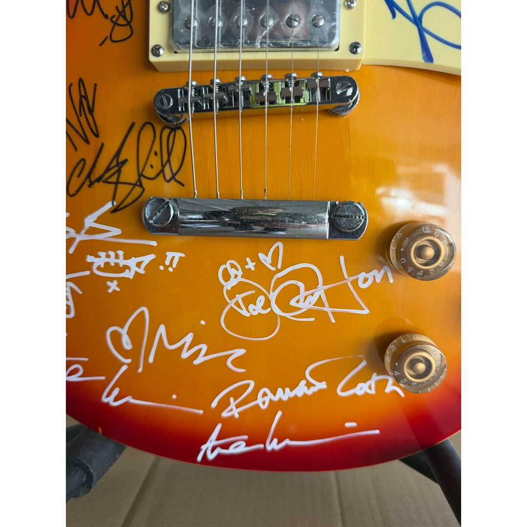 Tears For Fears, Simple Minds, and Simply Red les paul  vintage electric guitar signed with full provenance and photo proof..