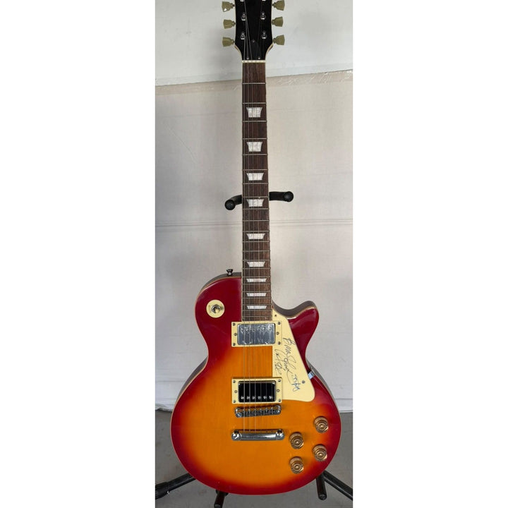 ACDC Angus Young Brian Johnson Les Paul vintage electric guitar signed with full provenance, photo proof and AI certification.