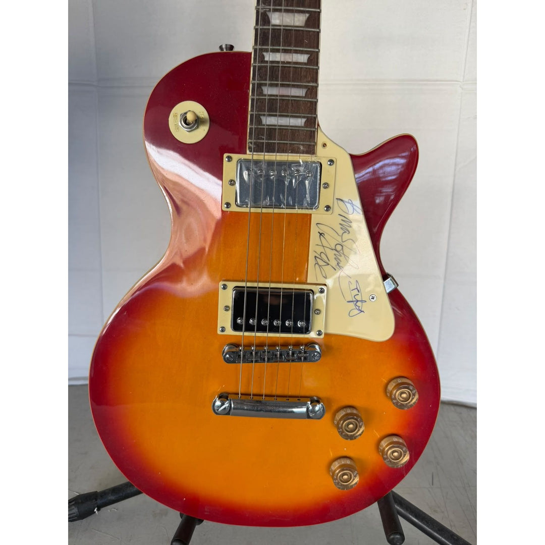 ACDC Angus Young Brian Johnson Les Paul vintage electric guitar signed with full provenance, photo proof and AI certification.