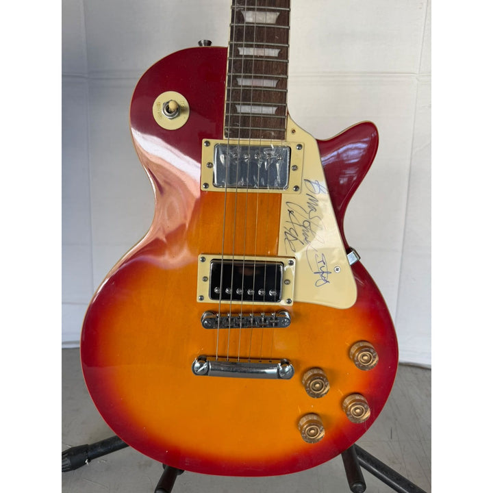 ACDC Angus Young Brian Johnson Les Paul vintage electric guitar signed with full provenance, photo proof and AI certification.
