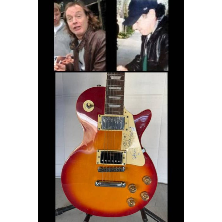 ACDC Angus Young Brian Johnson Les Paul vintage electric guitar signed with full provenance, photo proof and AI certification.