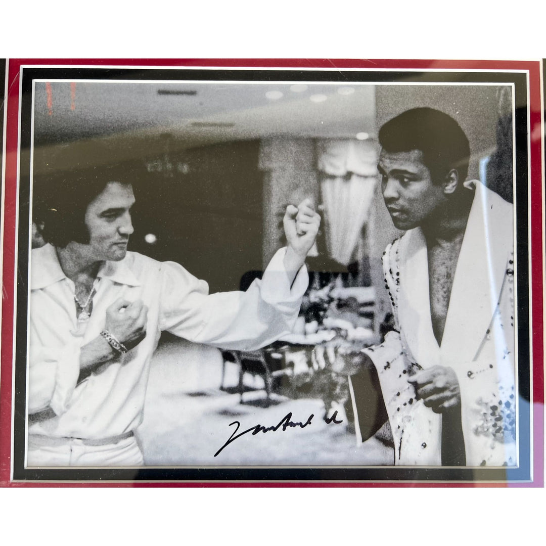 Muhammed Ali 8x10 photo and Elvis Presley autograph page with 19x37 museum quality frame signed with proof