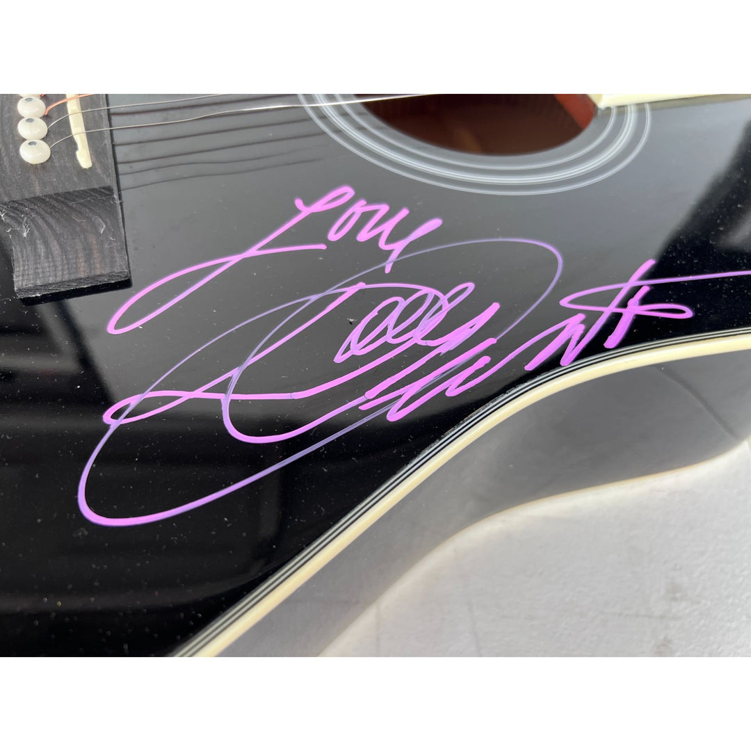 Dolly Parton and Kenny Rogers full size acoustic guitar signed with proof.