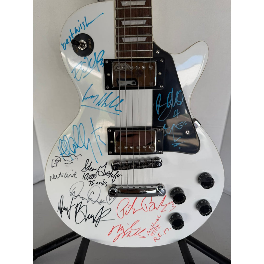 U2 The Edge, Adam Clayton, Larrey Mullen, Bono 10,000 Maniacs Natalie Merchant & REM Mike Mills, Michael Stipe, Bill Berry and Peter Buck .