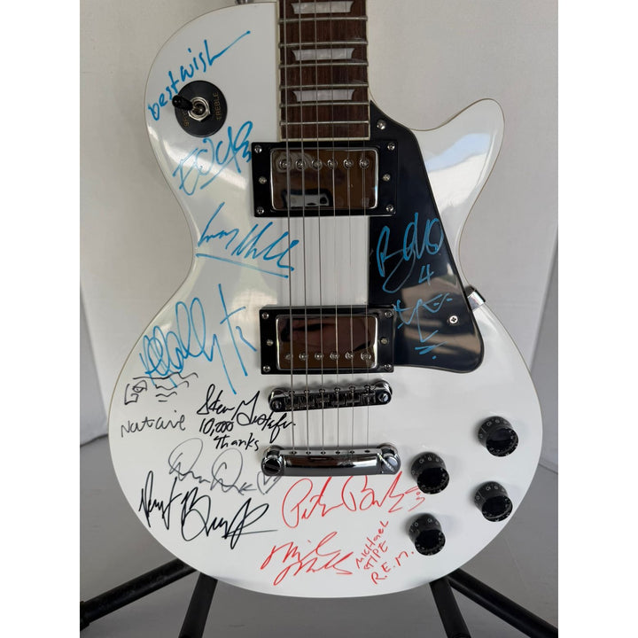 U2 The Edge, Adam Clayton, Larrey Mullen, Bono 10,000 Maniacs Natalie Merchant & REM Mike Mills, Michael Stipe, Bill Berry and Peter Buck .