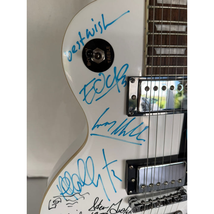 U2 The Edge, Adam Clayton, Larrey Mullen, Bono 10,000 Maniacs Natalie Merchant & REM Mike Mills, Michael Stipe, Bill Berry and Peter Buck .