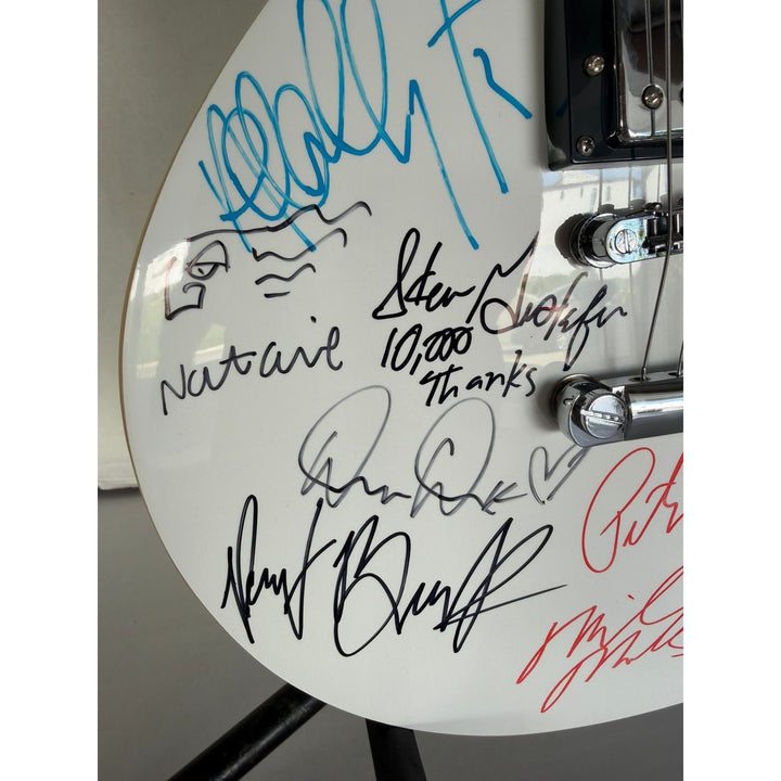 U2 The Edge, Adam Clayton, Larrey Mullen, Bono 10,000 Maniacs Natalie Merchant & REM Mike Mills, Michael Stipe, Bill Berry and Peter Buck .