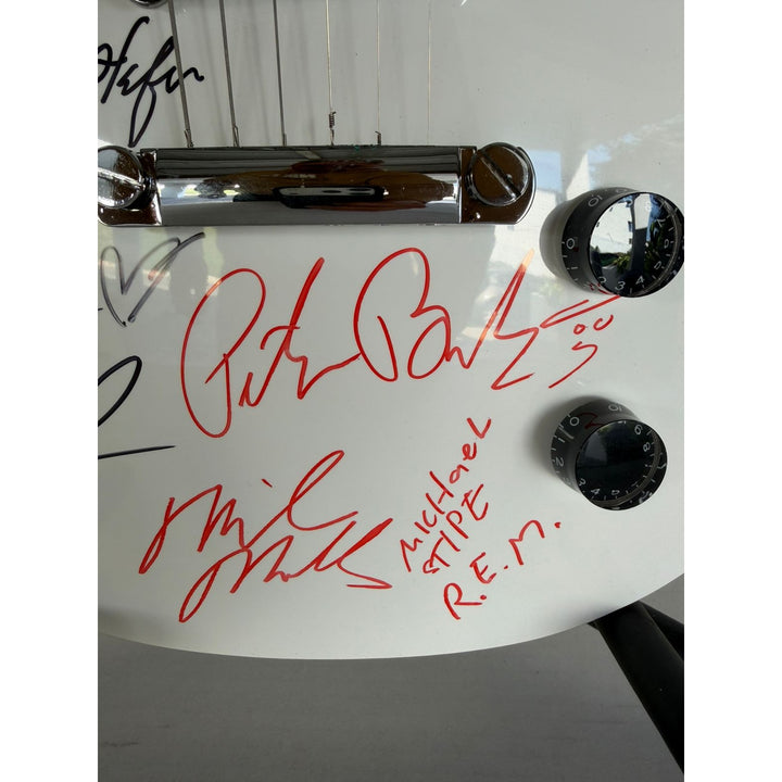 U2 The Edge, Adam Clayton, Larrey Mullen, Bono 10,000 Maniacs Natalie Merchant & REM Mike Mills, Michael Stipe, Bill Berry and Peter Buck .