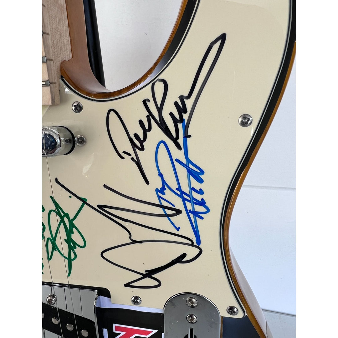 Iron Maiden Bruce Dickinson Steve Harris Niko McBain one of a kind full size electric guitar signed with proof.